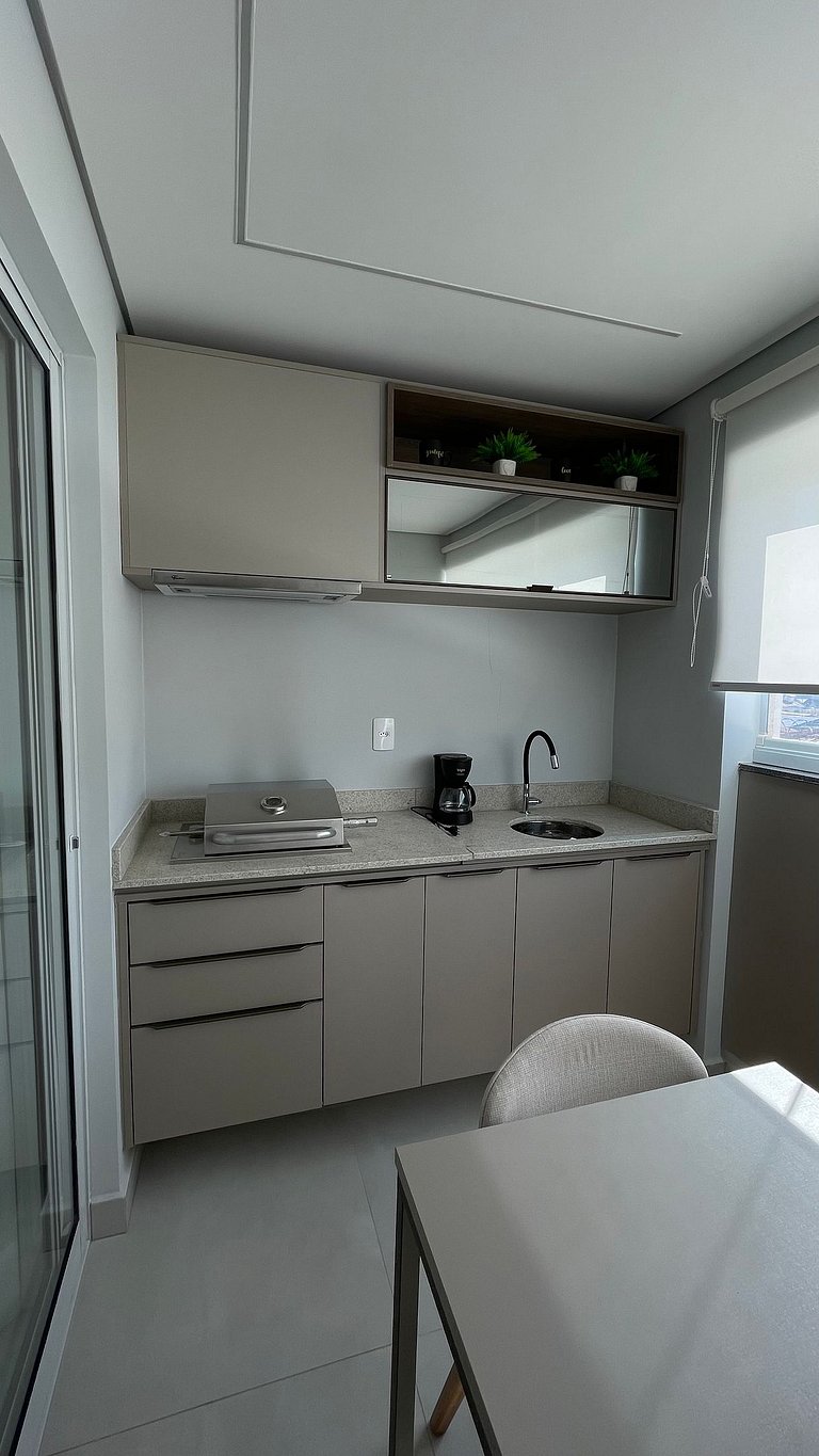 Apartamento com churrasqueira e piscina em Bauru