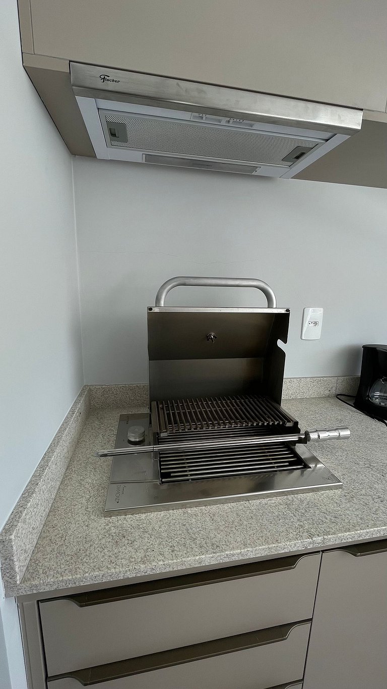 Apartamento com churrasqueira e piscina em Bauru